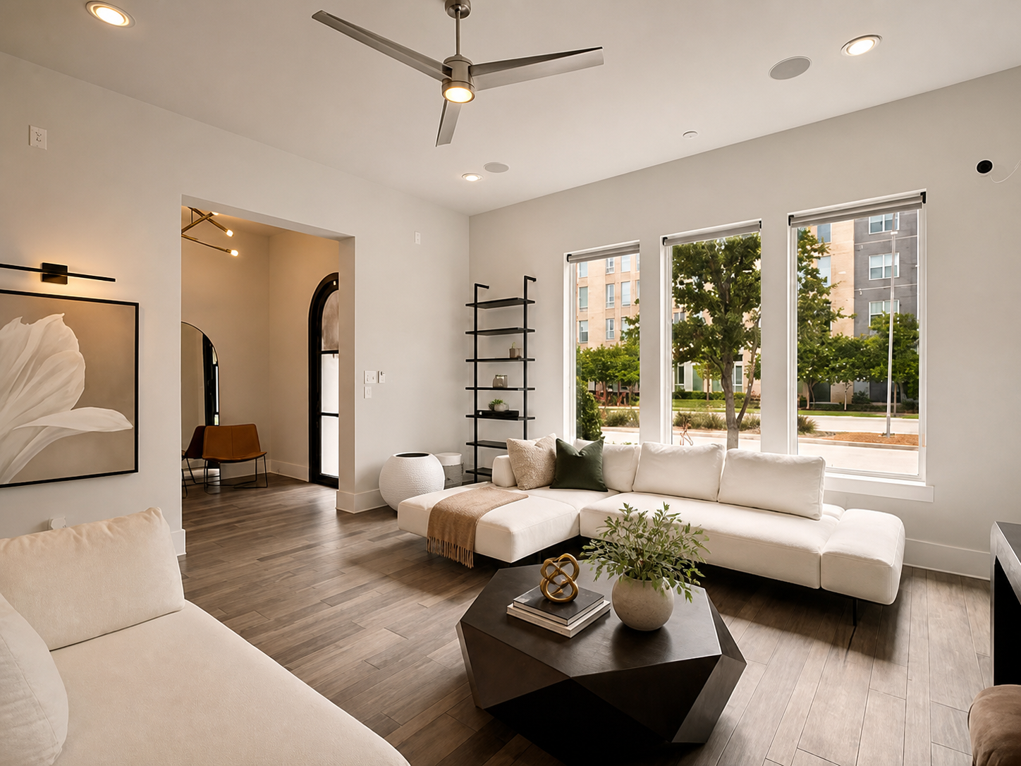 Refined living room at 7820 Merit Lane with warm textiles and contemporary furnishings